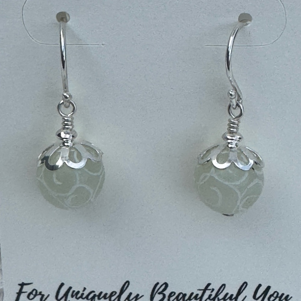 Ivory Agate Carved Sterling Silver Dangle Earrings.